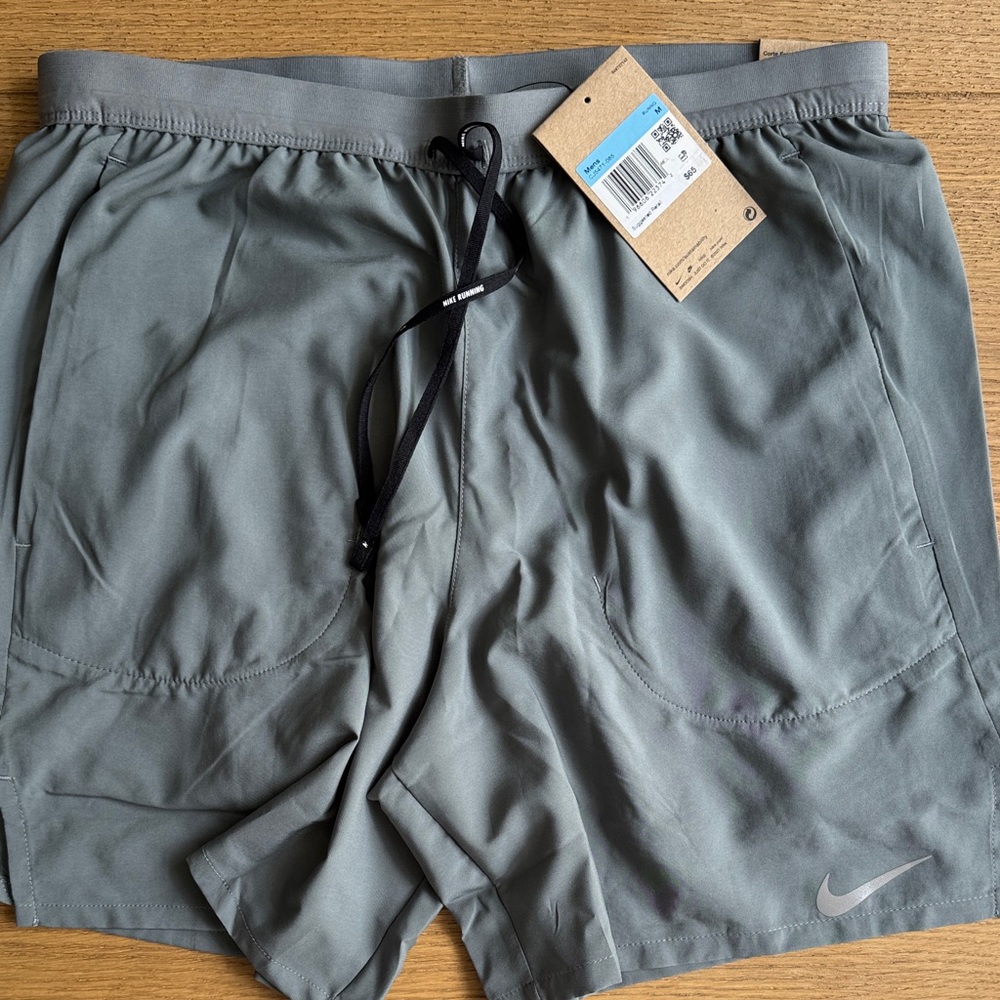 Men's Nike Grey Shorts with Drawstring and liner 7” length Medium.
